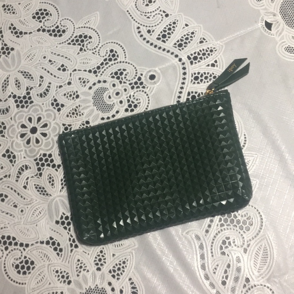 Green textured ipsy cosmetic bag